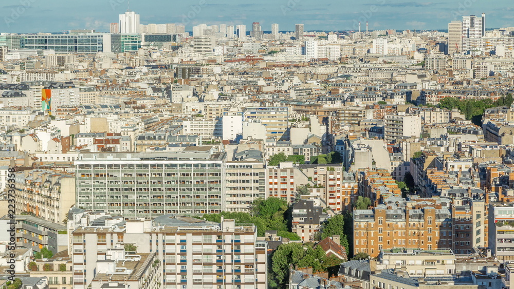 Aerial panorama above houses rooftops in a Paris timelapse Aerial panorama above houses rooftops in a Paris timelapse