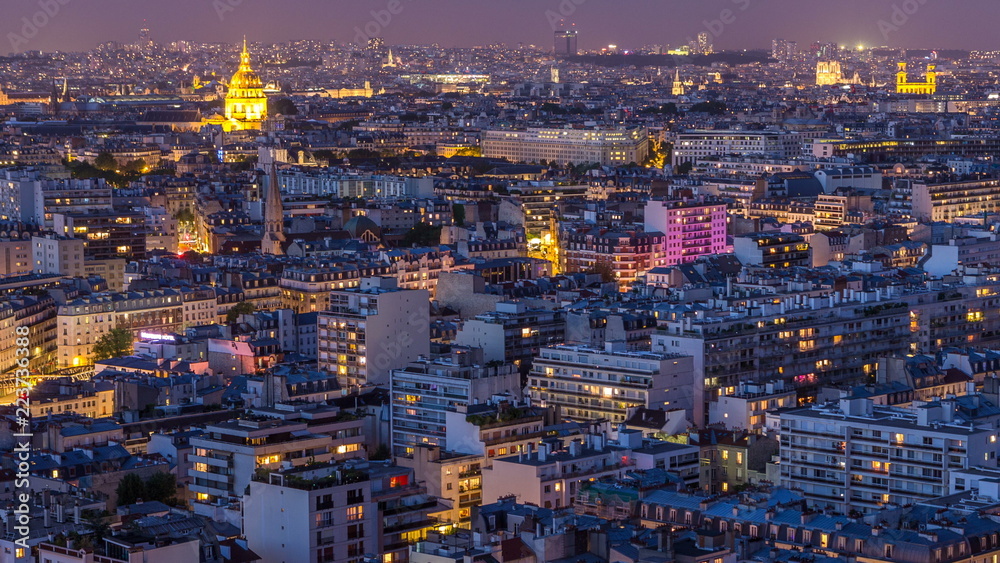 Aerial panorama above houses rooftops in a Paris day to night timelapse