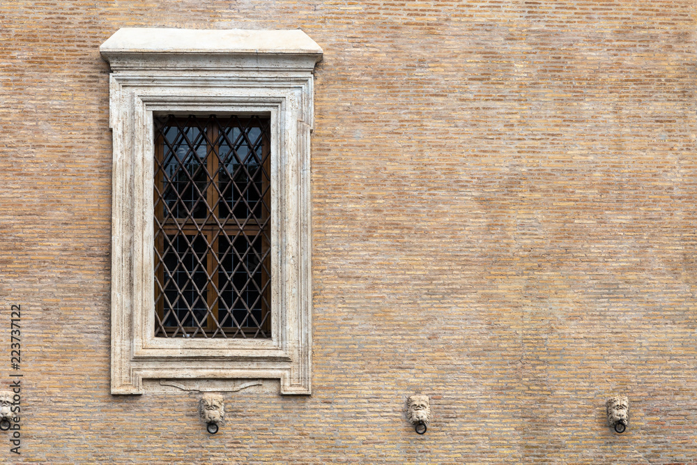 Obraz premium The window with iron gratings