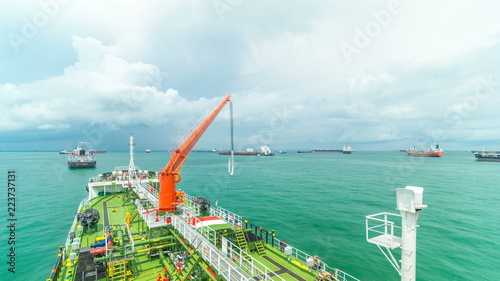 Green deck of the tanker under blue sky timelapse