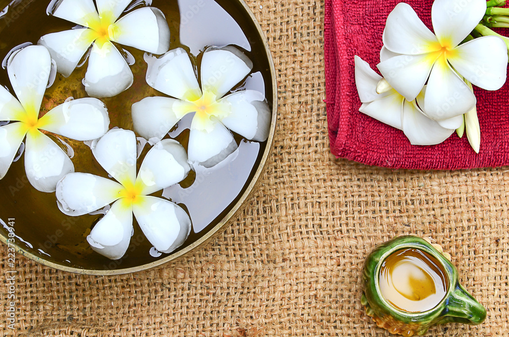 Plumeria flower on the background of hemp sacks. Plumeria flower on the background of hemp sacks.