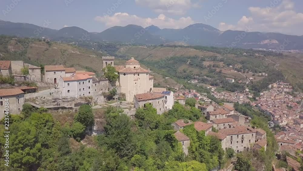 4k forwards aerial of abandoned village atop mountains, Laino Castello, Italy
