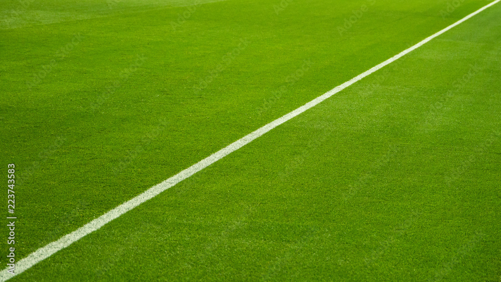 closeup of football (soccer) field with green grass