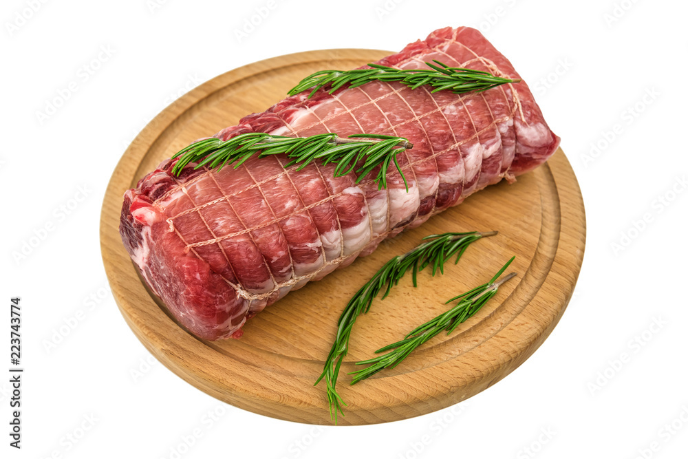 raw meat on wooden plate isolated