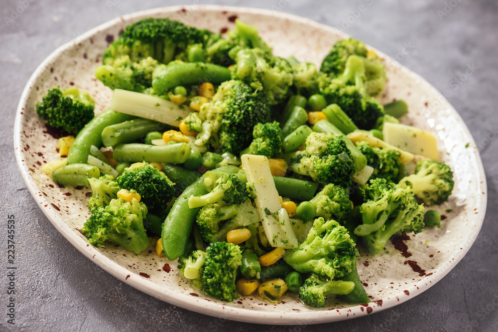 Cooked green vegetables as broccoli and green bean. Cooked green vegetables as broccoli and green bean.