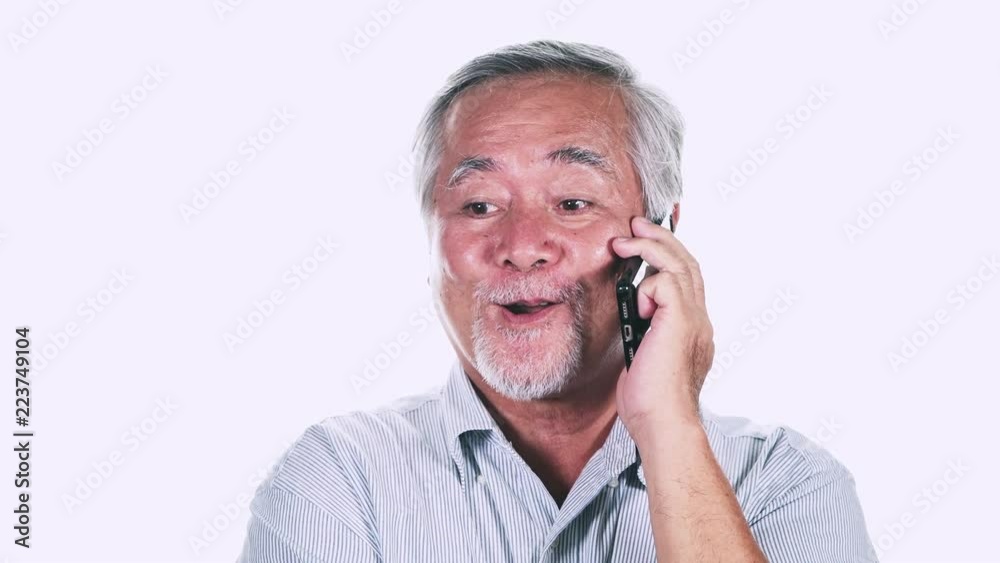 Happy Old man on phone isolated in white background. Talking on phone happy. Asian male with white beard. Senior lifestyle concept. Happy Old man on phone isolated in white background. Talking on phone happy. Asian male with white beard. Senior lifestyle concept.