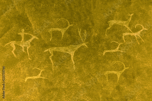 An image of ancient animals on the wall of the cave by an ancient man. ancient history, archeology.