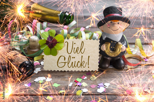 Canvas Print Silvesterkarte mit Konfetti Kleeblatt und Schornsteinfeger Wunderkerzen Viel Glü