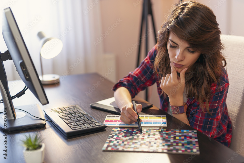 Fototapeta premium Female graphic designer working on a new project