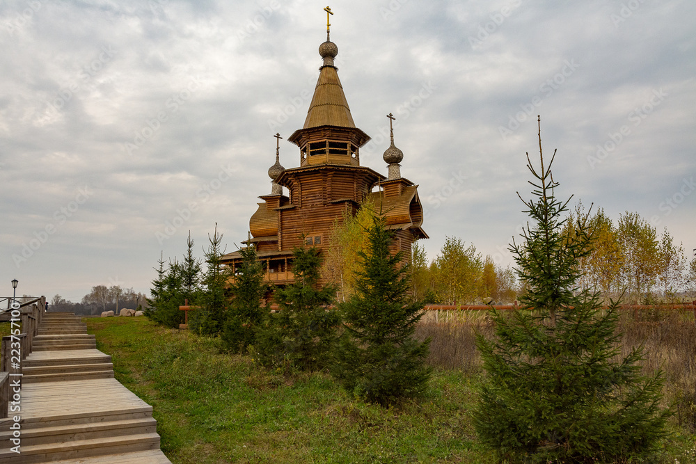 Wooden Orthodox Church of St. Sergius in Svyatogorie in the autumn day, Moscow region, Sergiev Posad district, with. Vzglyadnevo, Russia. Wooden Orthodox Church of St. Sergius in Svyatogorie in the autumn day, Moscow region, Sergiev Posad district, with. Vzglyadnevo, Russia.