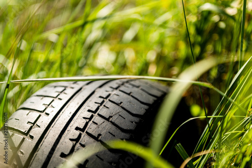 car tire in the grass