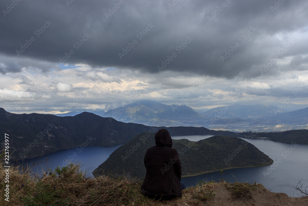 View on a tourist at vulcano lake cuicocha close to otavalo, ecuador