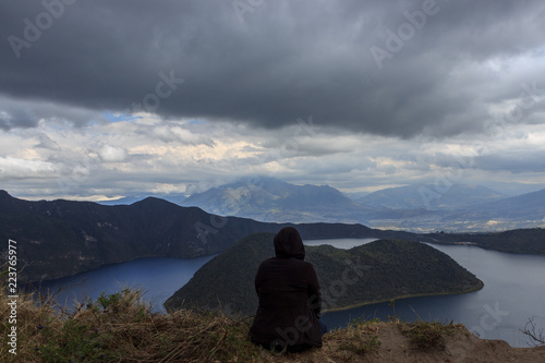 View on a tourist at vulcano lake cuicocha close to otavalo, ecuador