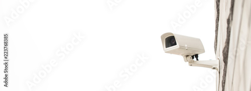 Surveillance camera on wall