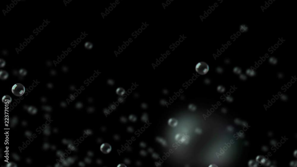 Water bubbles rising on on black background. 4K loop