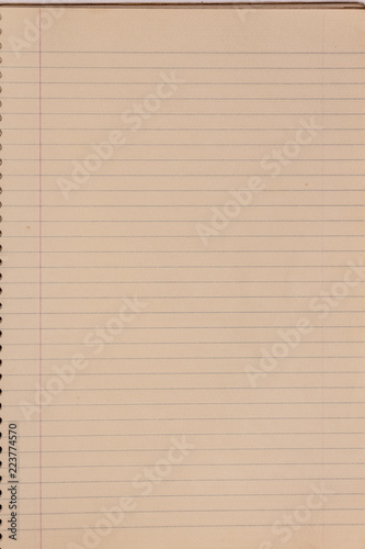 Página amareladas de caderno velho e usado com várias anotações  photo
