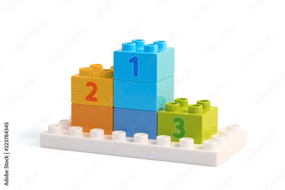 Right side view of winners pedestal built from colorful blocks.