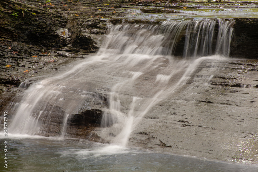 Waterfall on small creek in late summer