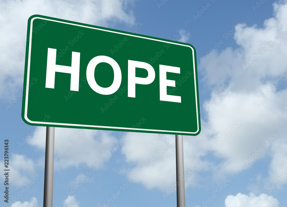 Hope sign on blue sky background Hope sign on blue sky background
