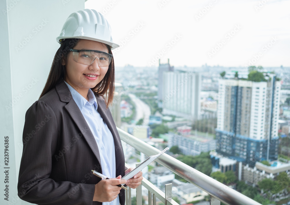 Portrait asia woman engineer working at construction site Portrait asia woman engineer working at construction site