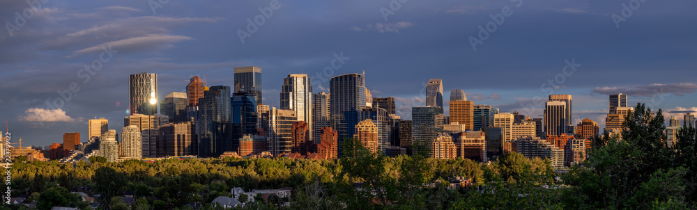 Sweeping skyline view at dusk in Calgary, Alberta. Calgary is home to many oil companies.
