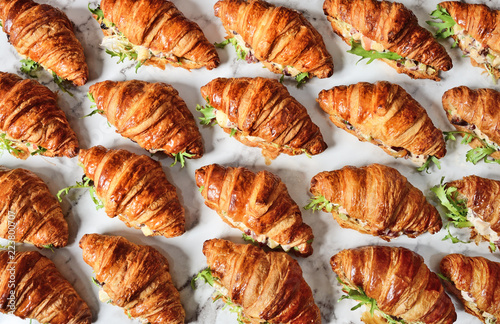 Valokuva Chicken salad croissant sandwich on buffet table