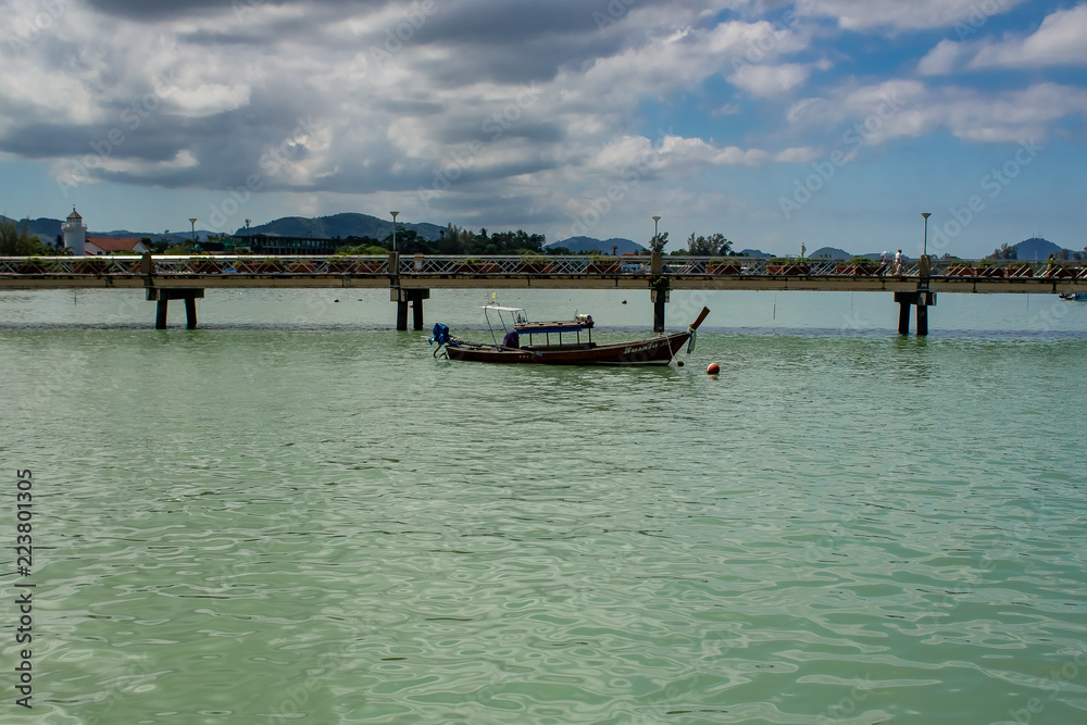 Anchored longboat at Chalong Phuket, Thailand