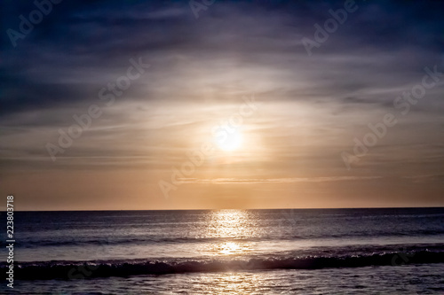 Obraz na płótnie Blue Shaded Sunset at Karon Beach Over the Ocean w salonie