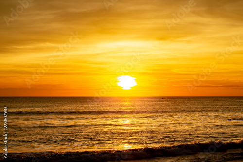 Fototapeta Naklejka Na Ścianę i Meble -  Deep and Rich ORange Sunset at Karon Beach