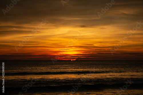 Obraz na płótnie Deep and Rich ORange Sunset at Karon Beach w salonie