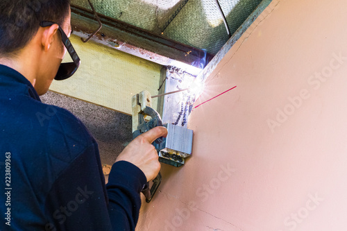 Workers are welding steel