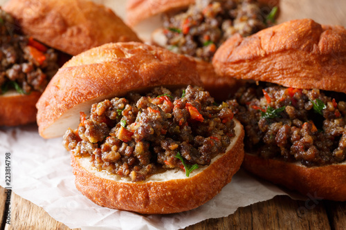 Картината върху платно South African food: deep-fried vetkoek sandwich with meat curry close-up