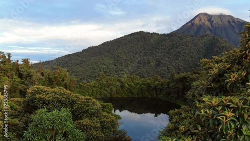 Rising out of the forest to view Sumaco Volcano clothed in pristine montane rainforest at dawn and a volcanic crater lake -  Laguna Wawa Sumaco. Situated  in the Ecuadorian Amazon. 