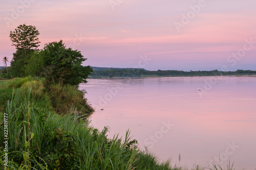 Atmosphere sunrise at the Mekong river is bordered by Thailand and Laos