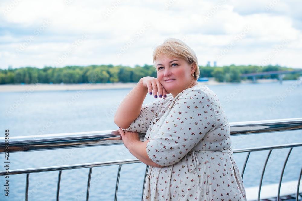 Size plus mature lady. Enjoying at day, concept human with excess weight. Senior woman take a rest and have a good mood. Life of xxl people Size plus mature lady. Enjoying at day, concept human with excess weight. Senior woman take a rest and have a good mood. Life of xxl people