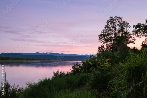 Atmosphere sunrise at the Mekong river is bordered by Thailand and Laos