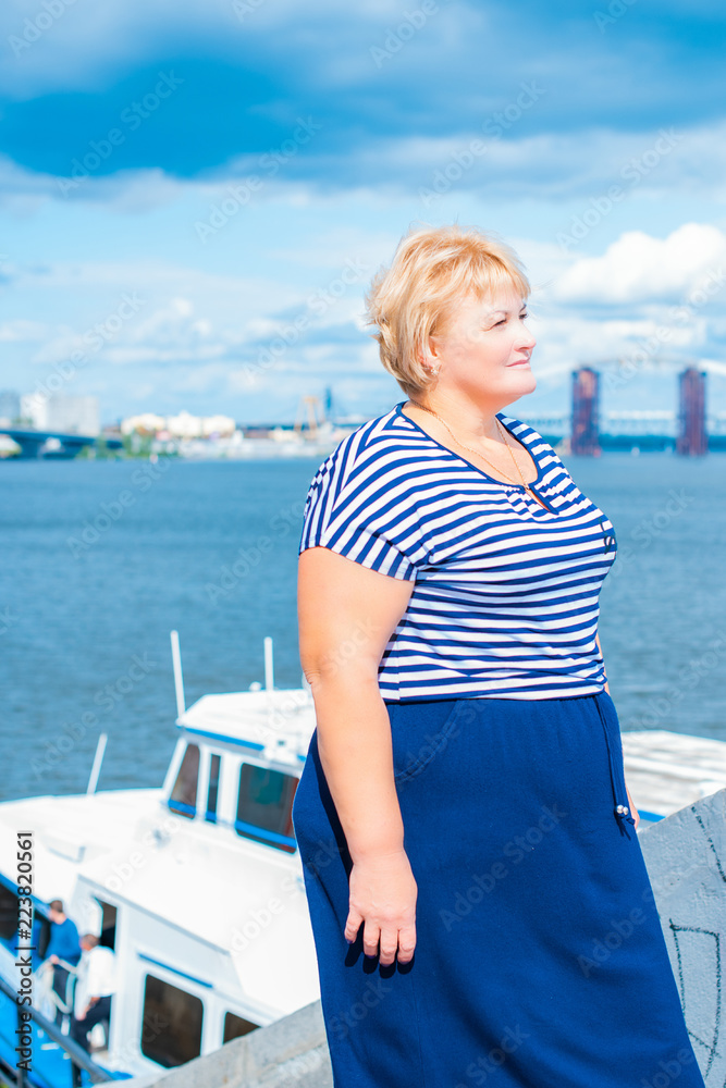 Size plus mature lady. Enjoying at day, concept human with excess weight. Senior woman take a rest and have a good mood. Life of xxl people Size plus mature lady. Enjoying at day, concept human with excess weight. Senior woman take a rest and have a good mood. Life of xxl people