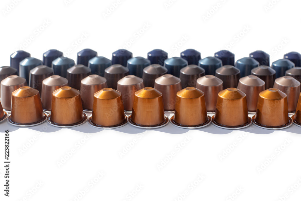 Coffee capsules in fourlines on a white background isolated Coffee capsules in fourlines on a white background isolated