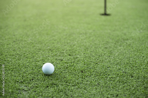 golf ball on the green golf.