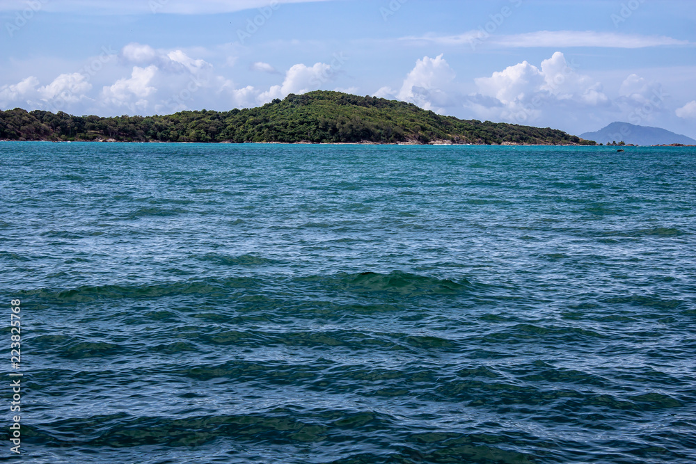 Island in the distance off the coast of Rawaii