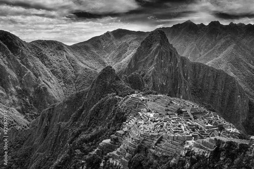 View of the Lost Incan City of Machu Picchu near Cusco, Peru. Machu Picchu is a Peruvian Historical Sanctuary and a UNESCO World Heritage Site. Machu Picchu is located in the Cusco Region in Peru.