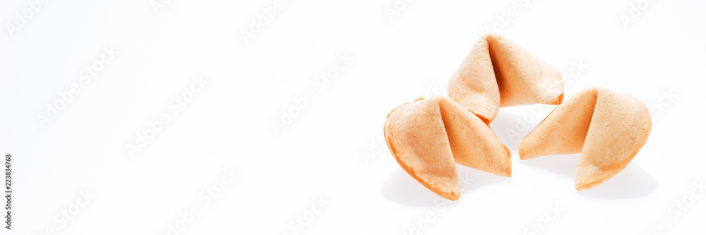 Three surprise fortune cookies isolated on white background