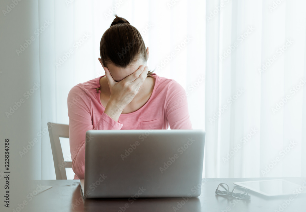 Over worked secretary sitting at office desk. Over worked secretary sitting at office desk.