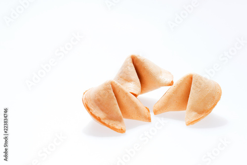 Three surprise fortune cookies isolated on white background