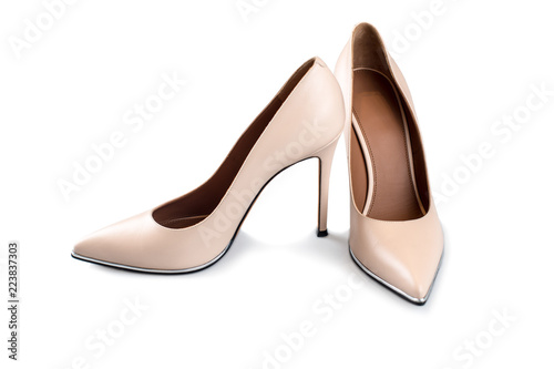 Beige high heel shoes isolated on white isolated