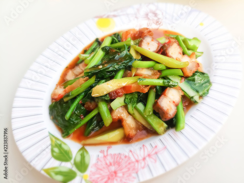 Stir fried kale with crispy pork / Thai Food is delicious