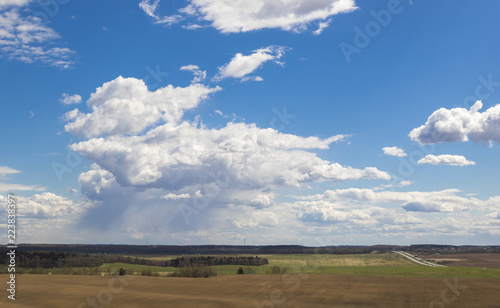 Rural landscape with cumulus clouds