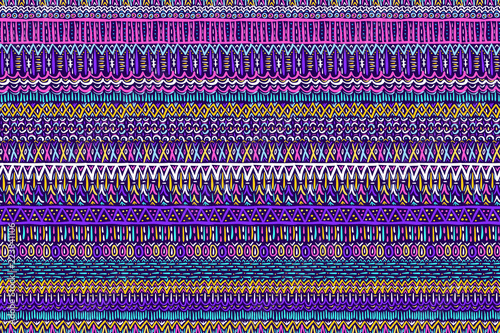 Tribal pattern. Embroidery ornament. Ethnic style. Fabric design effect texture. Boho fashion. Traditional textile. Vector seamless pattern for fashion design, interior or printed products.