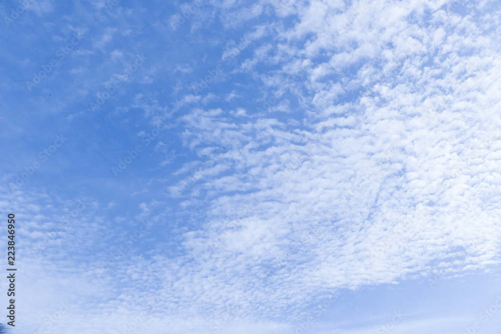 Beautiful clouds with blue sky background. Nature weather.cloud is water vapour in the atmosphere that has condensed into very small water droplets or ice crystals that appear in visible shapes