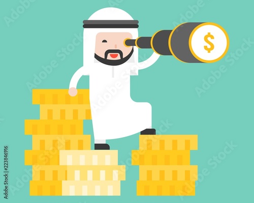 Arab business man stands on stack of gold coin using monocular